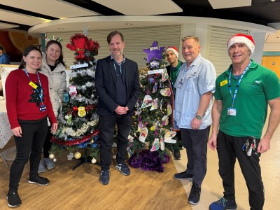 Gary Flockhart Director of Nursing, Therapies & Patient Partnership with Bowmere staff.jpg