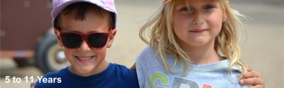 Long banner with image showing the face of a boy and girl